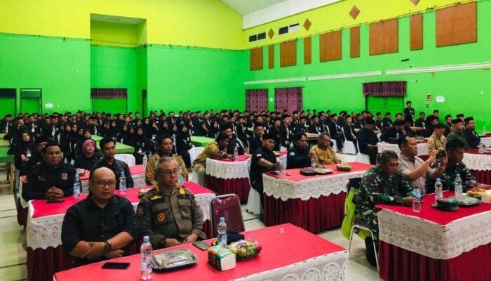 Ratusan Pesilat PSHT Hitamkan Gedung Serbaguna Pemkab Blitar lama, Jalani Prosesi Pengesahan Warga Baru Tahun 2025