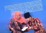 penandatanganan kesepakatan secara serentak di Dyandra Convention Center Surabaya